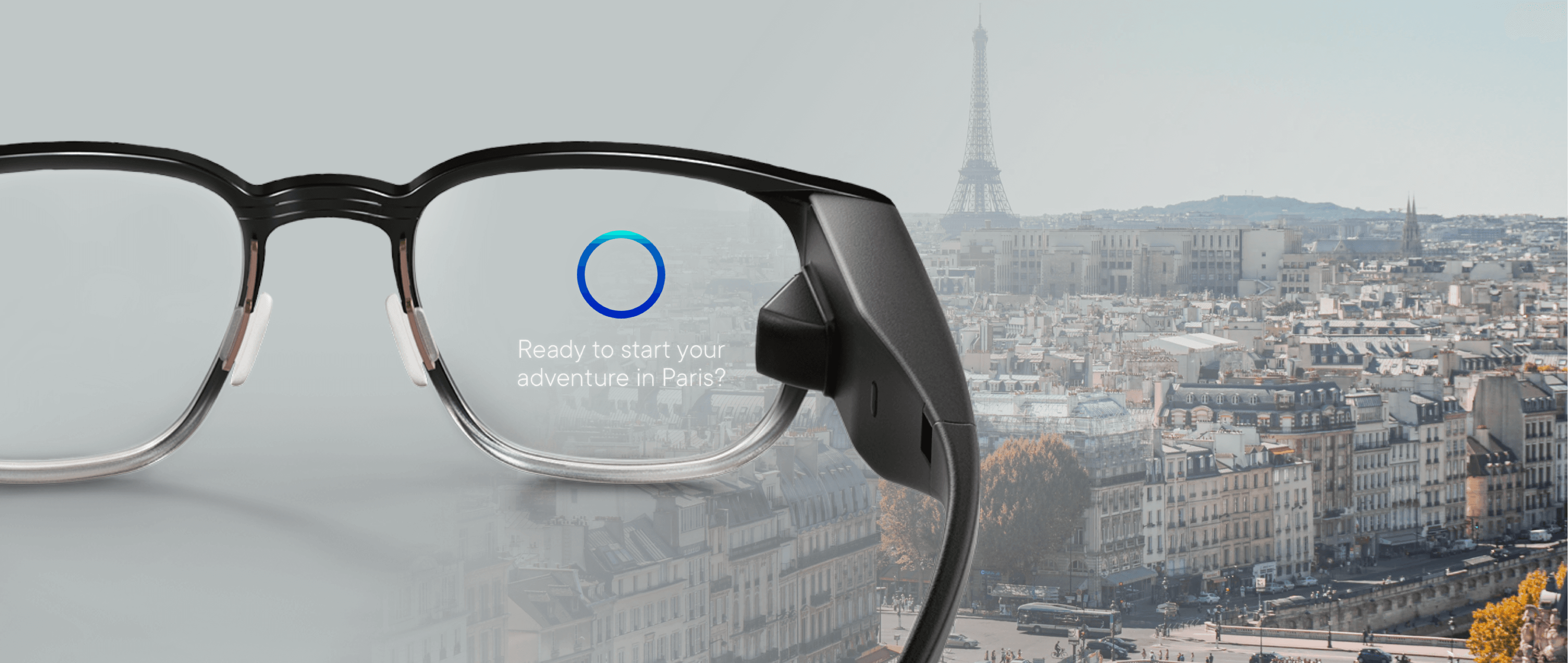 A Pair of North AR smart glasses imposed on a background of Paris with the Eiffel Tower. The glasses say "Ready to start your adventure in Paris?"